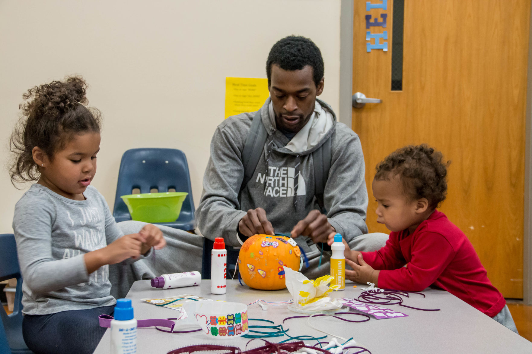 Zykiah Brown, 4, with dad Conrad and brother Zayvion, 1